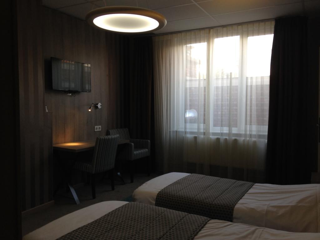 Hotel Mille Colonnes Louvain Chambre photo